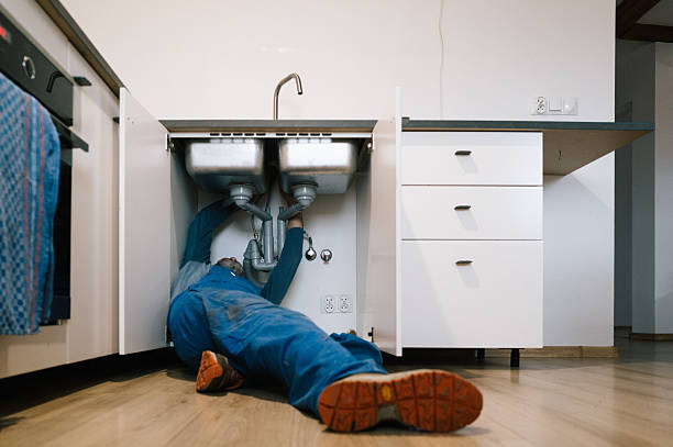 Professional Emergency Plumber technician working in Claridge, PA